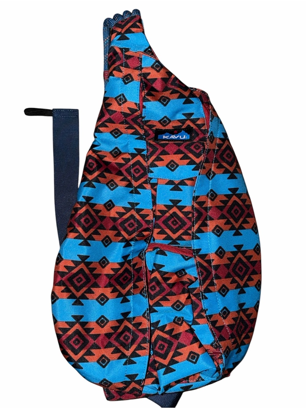 Kavu Aztec Print Sling Pack in Bright Blue and Rust Red